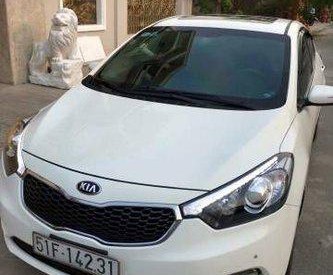 Kia K3   AT 2015 - Bán Kia K3 AT năm sản xuất 2015, màu trắng số tự động