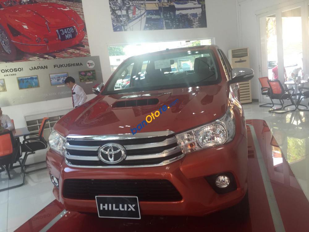Toyota Hilux 2.4G (4x4) số tay, màu đỏ cam, cam kết giá tốt nhất - LH: 0902485139