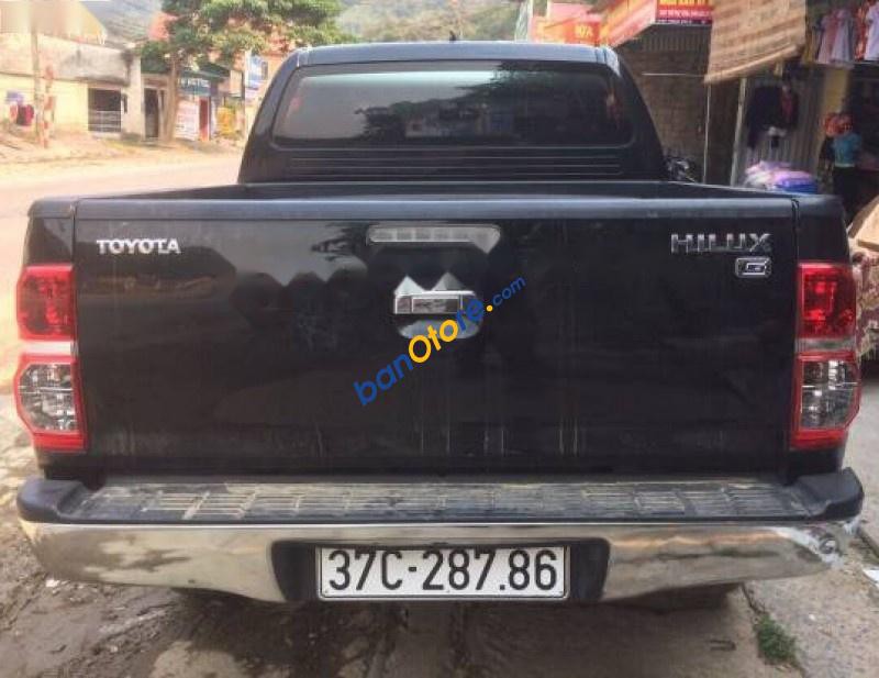 Bán xe Toyota Hilux 3.0G 4x4 MT đời 2013, màu đen, nhập khẩu