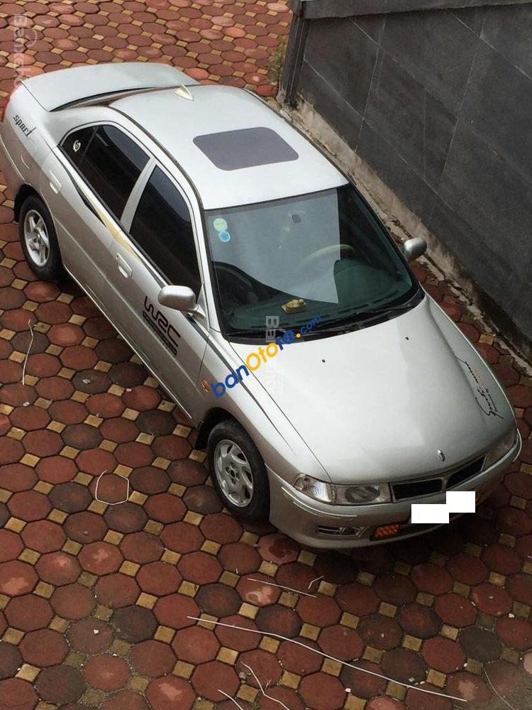 Đang có nhu cầu bán Lancer GLXI 2001, màu bạc