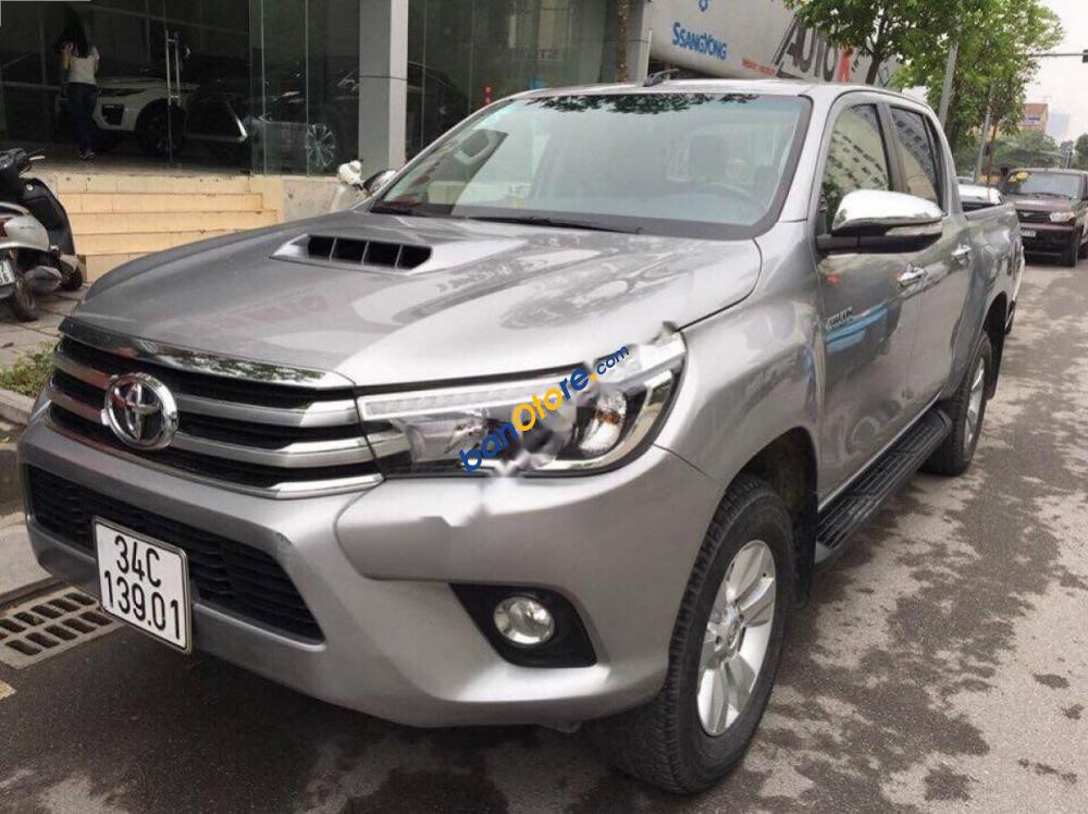 Bán Toyota Hilux 3.0G 4x4 AT năm 2016, màu bạc, nhập khẩu