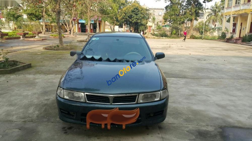 Cần bán Mitsubishi Lancer năm sản xuất 2002, màu xanh lam, xe nhập giá cạnh tranh