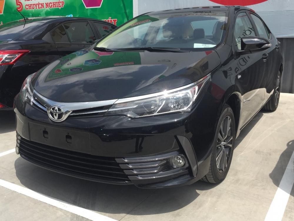 Cần bán Toyota Corolla altis 1.8G (CVT) năm 2018, màu đen, giá chỉ 715 triệu