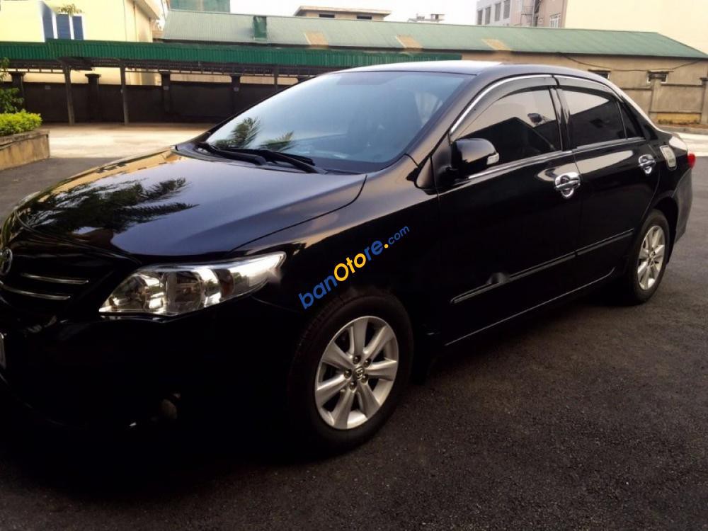 Chính chủ bán ô tô Toyota Corolla altis đời 2014, màu đen