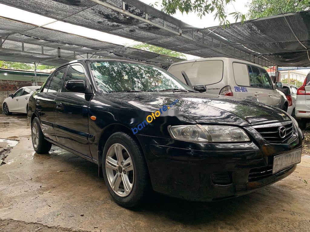 Bán xe Mazda 626 MT sản xuất 2002, màu đen, giá tốt