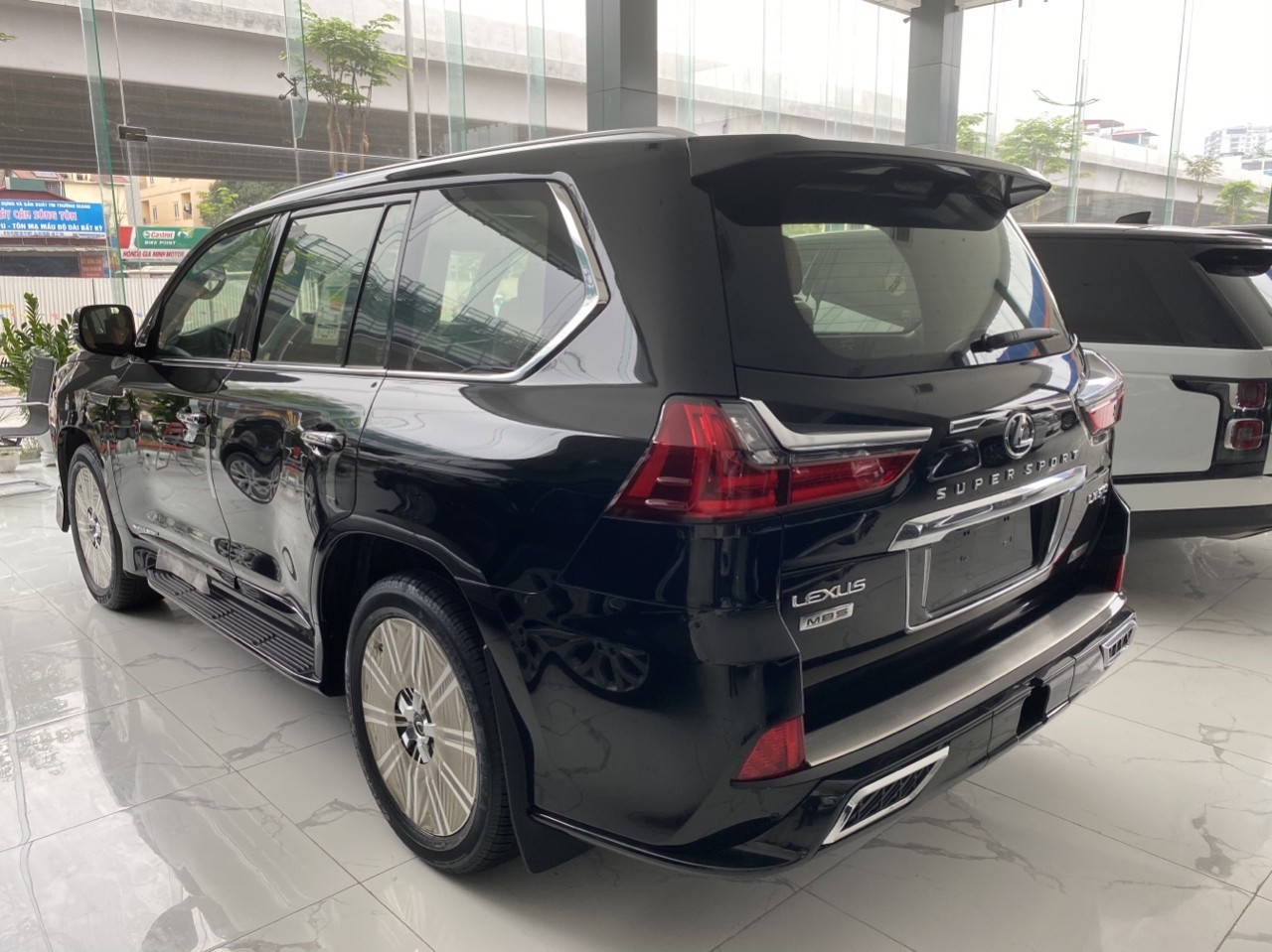 Lexus LX 2020 - Cần bán Lexus LX 570 MBS 4 chỗ sản xuất 2020, màu đen, nhập khẩu