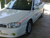 Bán xe oto Kia Spectra 2004 - Bán xe Kia Spectra đời 2004, màu trắng