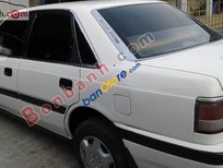 Cần bán Mazda 323 1990 - Cần bán lại xe Mazda 323 1990, màu trắng, nhập khẩu 