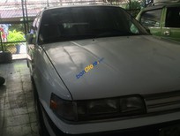 Cần bán xe Mazda 323 1989 - Cần bán Mazda 323 đời 1989, màu trắng 