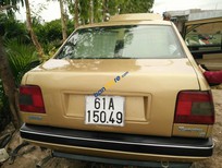 Cần bán Fiat Tempra   1997 - Cần bán lại xe Fiat Tempra đời 1997, màu ghi vàng  