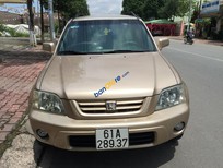 Cần bán Honda CR V AT 2001 - Cần bán Honda CR V AT 2001, màu vàng, nhập khẩu chính hãng xe gia đình, giá tốt
