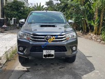 Cần bán Toyota Hilux   2016 - Bán Toyota Hilux sản xuất 2016, màu đen, nhập khẩu Thái
