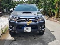 Cần bán Toyota Hilux 3.0G 4x4MT 2016 - Cần bán lại xe Toyota Hilux 3.0G 4x4MT năm 2016, màu xám 