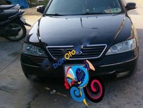 Bán xe oto Ford Mondeo 2003 - Xe Ford Mondeo năm 2003, màu đen