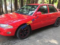 Proton Wira   1996 - Bán Proton Wira đời 1996, màu đỏ, xe đã làm lại, đẹp, dáng thể thao