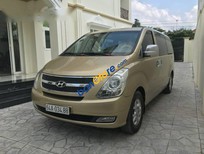 Hyundai Grand Starex   2007 - Cần bán xe Hyundai Grand Starex sản xuất 2007, màu vàng, giá 620tr