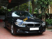 BMW 3 Series  320i  2012 - Cần bán BMW 3 Series 320i sản xuất 2012, màu đen số tự động