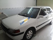 Bán xe oto Mazda 323   1995 - Cần bán Mazda 323 sản xuất 1995, màu trắng, nhập khẩu