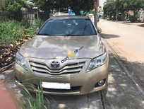 Bán Toyota Camry LE 2010 - Bán xe Toyota Camry LE đời 2010, màu vàng, xe chính chủ rất ít sử dụng, mới chạy 36000km