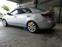 Bán xe oto Kia Forte 2010 - Bán lại xe Kia Forte đời 2010, màu bạc, xe gia đình đi kỹ còn rất mới nguyên, bao test