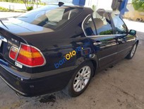 Bán BMW 3 Series  318i 2004 - Bán xe BMW 3 Series 318i đời 2004, màu đen, nội ngoại thất đẹp