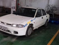 Mitsubishi Lancer MT 1993 - Cần bán Mitsubishi Lancer MT sản xuất năm 1993, màu trắng, xe nhập