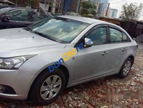 Daewoo Lanos MT 2009 - Cần bán gấp Daewoo Lanos MT sản xuất năm 2009, màu bạc 