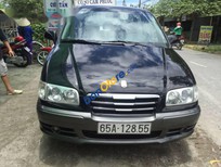 Cần bán xe Hyundai Trajet 2004 - Cần bán lại xe Hyundai Trajet năm sản xuất 2004, màu đen 