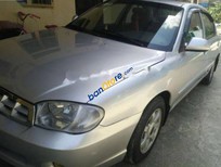 Bán xe oto Kia Spectra 1.6 MT 2004 - Bán Kia Spectra 1.6 MT năm sản xuất 2004, màu bạc, giá 125tr