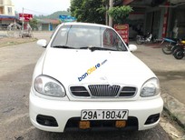 Daewoo Lanos 2004 - Cần bán gấp Daewoo Lanos sản xuất 2004, màu trắng, nhập khẩu