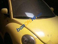 Cần bán xe Volkswagen Beetle   2004 - Bán Volkswagen Beetle sản xuất 2004, màu vàng, xe nhập