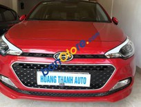 Cần bán Hyundai i20   1.4AT  2015 - Cần bán lại xe Hyundai i20 1.4AT đời 2015, xe 1 chủ biển tỉnh, đi 28000km, màu đỏ   