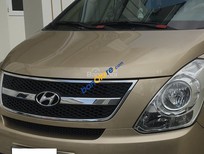 Cần bán xe Hyundai Grand Starex 2007 - Cần bán Hyundai Grand Starex năm sản xuất 2007, màu vàng