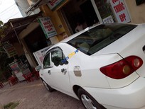 Cần bán xe Toyota Corolla 2002 - Cần bán lại xe Toyota Corolla năm 2002, màu trắng như mới 