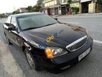 Bán Daewoo Magnus   2004 - Bán ô tô Daewoo Magnus đời 2004, màu đen 