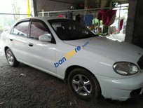 Cần bán Daewoo Lanos 2002 - Cần bán lại xe Daewoo Lanos 2002, màu trắng,  xe cũ