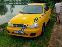 Cần bán xe Daewoo Lanos 2002 - Bán ô tô Daewoo Lanos năm 2002, màu vàng, 80 triệu