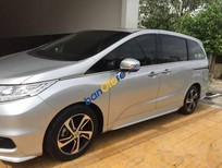 Cần bán Honda Odyssey 2016 - Bán xe Honda Odyssey năm 2016, odo mới 34.000km còn bảo hành chính hãng