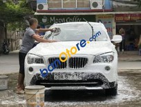 BMW X1   2012 - Bán BMW X1 đời 2012, màu trắng, nhập khẩu nguyên chiếc chính chủ, 900 triệu