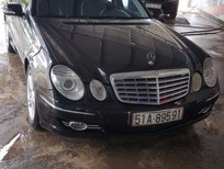 Cần bán xe Mercedes-Benz E200 2009 - Cần bán lại xe Mercedes đời 2009, màu đen, nhập khẩu nguyên chiếc, giá chỉ 590 triệu