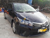 Cần bán xe Toyota Corolla altis 1.8G MT 2014 - Bán Toyota Corolla altis 1.8G MT đời 2014, màu đen xe gia đình