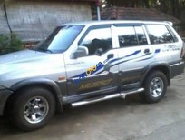 Ssangyong Musso 2001 - Cần bán gấp Ssangyong Musso đời 2001, màu bạc xe gia đình