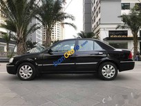 Ford Laser   Deluxe AT 2006 - Bán Ford Laser Deluxe AT đời 2006, màu đen xe gia đình, giá 265tr