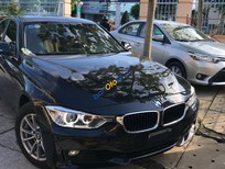 Cần bán xe BMW 3 Series 320i  2014 - Cần bán xe BMW 3 Series 320i sản xuất năm 2014, màu đen, nhập khẩu nguyên chiếc
