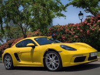 Bán Porsche Cayman 718 2017 - Cần bán lại xe Porsche Cayman 718 2017, màu vàng, nhập khẩu nguyên chiếc như mới