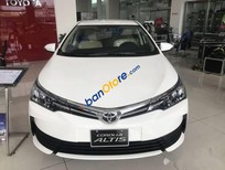 Cần bán Toyota Corolla altis 2018 - Bán ô tô Toyota Corolla altis sản xuất 2018, màu trắng, giá chỉ 658 triệu