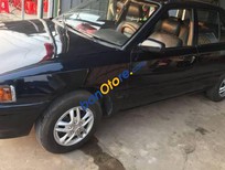 Bán xe oto Mazda 323 1995 - Bán ô tô Mazda 323 sản xuất năm 1995, màu đen xe gia đình, 68tr