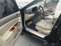 Bán xe oto Chevrolet Cruze 2005 - Bán Chevrolet Cruze đời 2005, màu đen chính chủ, 335 triệu