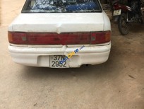 Mazda 323 1994 - Cần bán Mazda 323 đời 1994, màu trắng