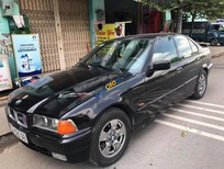 BMW 3 Series 320i 1994 - Cần bán lại xe BMW 3 Series 320i năm 1994, màu đen số sàn